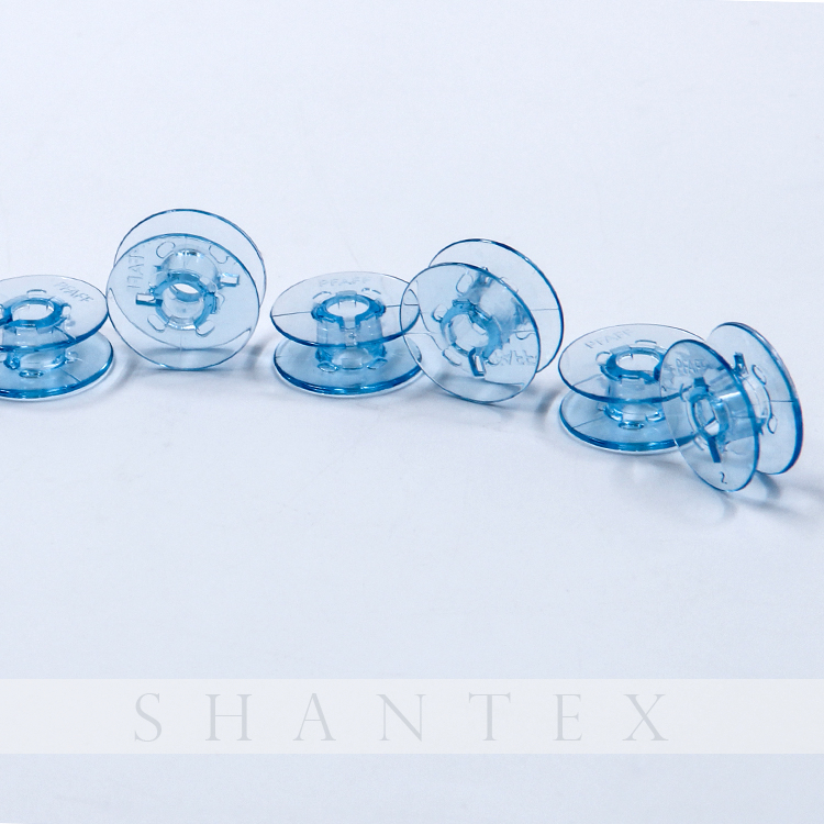 Accessori per macchine da cucire a bobina in plastica con filo blu vuoto piccolo per uso domestico